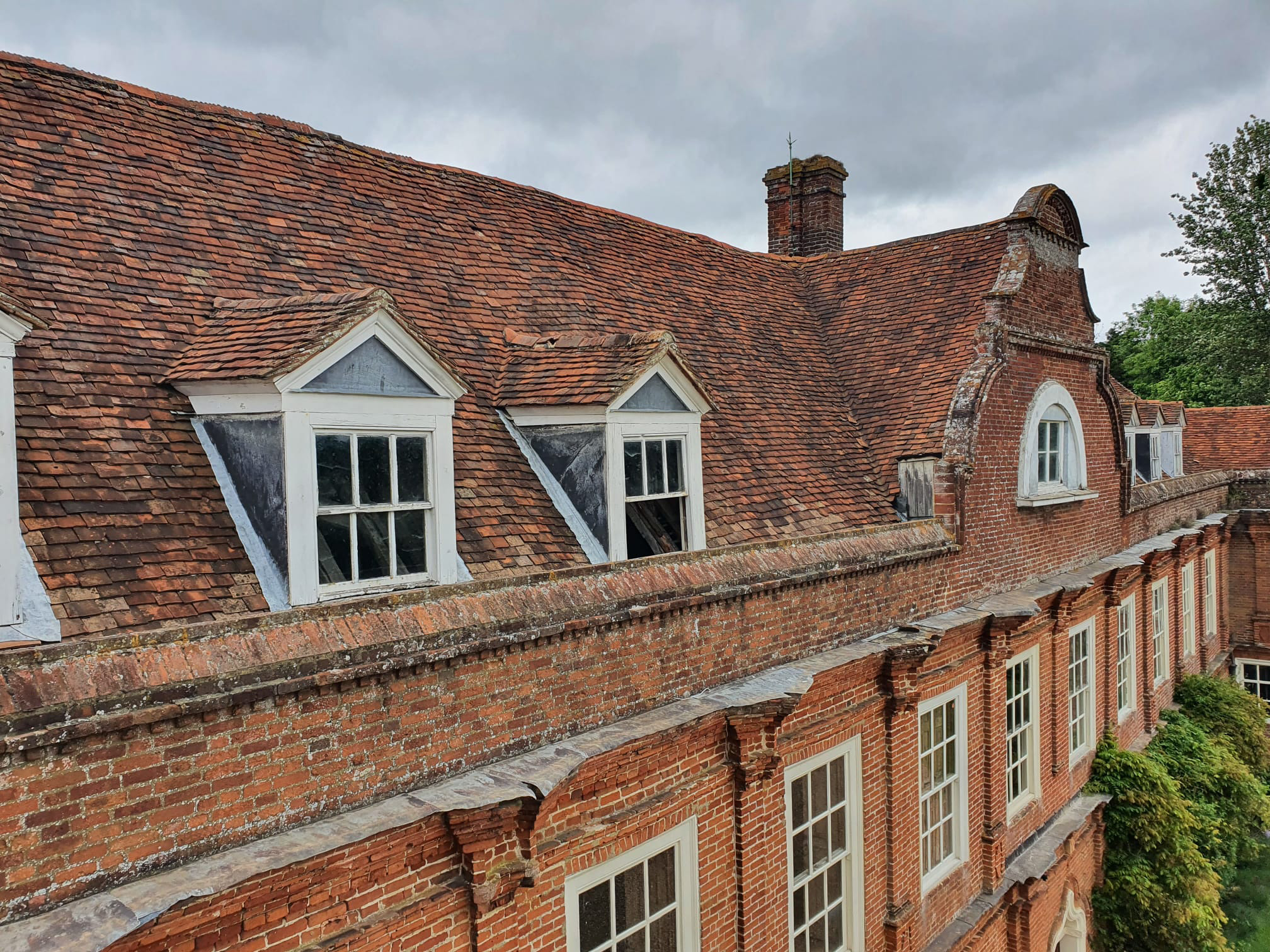 Roof before repair to West Hosley Place